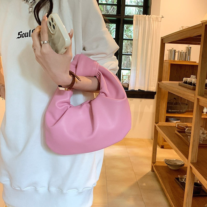 Simple handbag. High-end niche cloud bag.