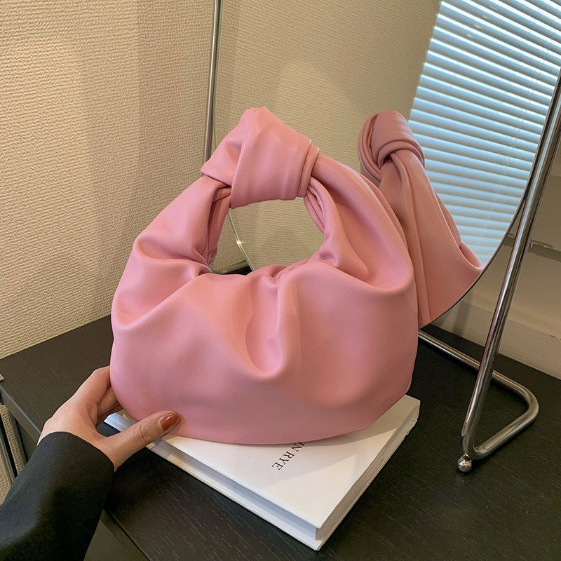 Simple handbag. High-end niche cloud bag.