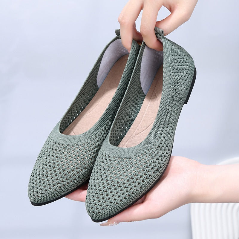 Solid color pointed flat bottomed women's shoes. Casual and breathable hollowed out cloth shoes.