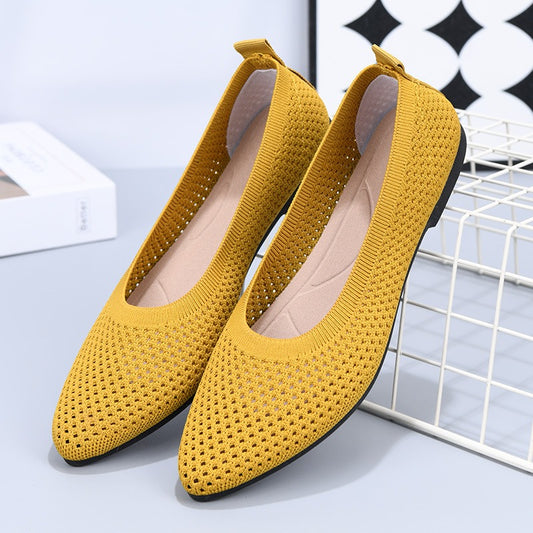 Solid color pointed flat bottomed women's shoes. Casual and breathable hollowed out cloth shoes.